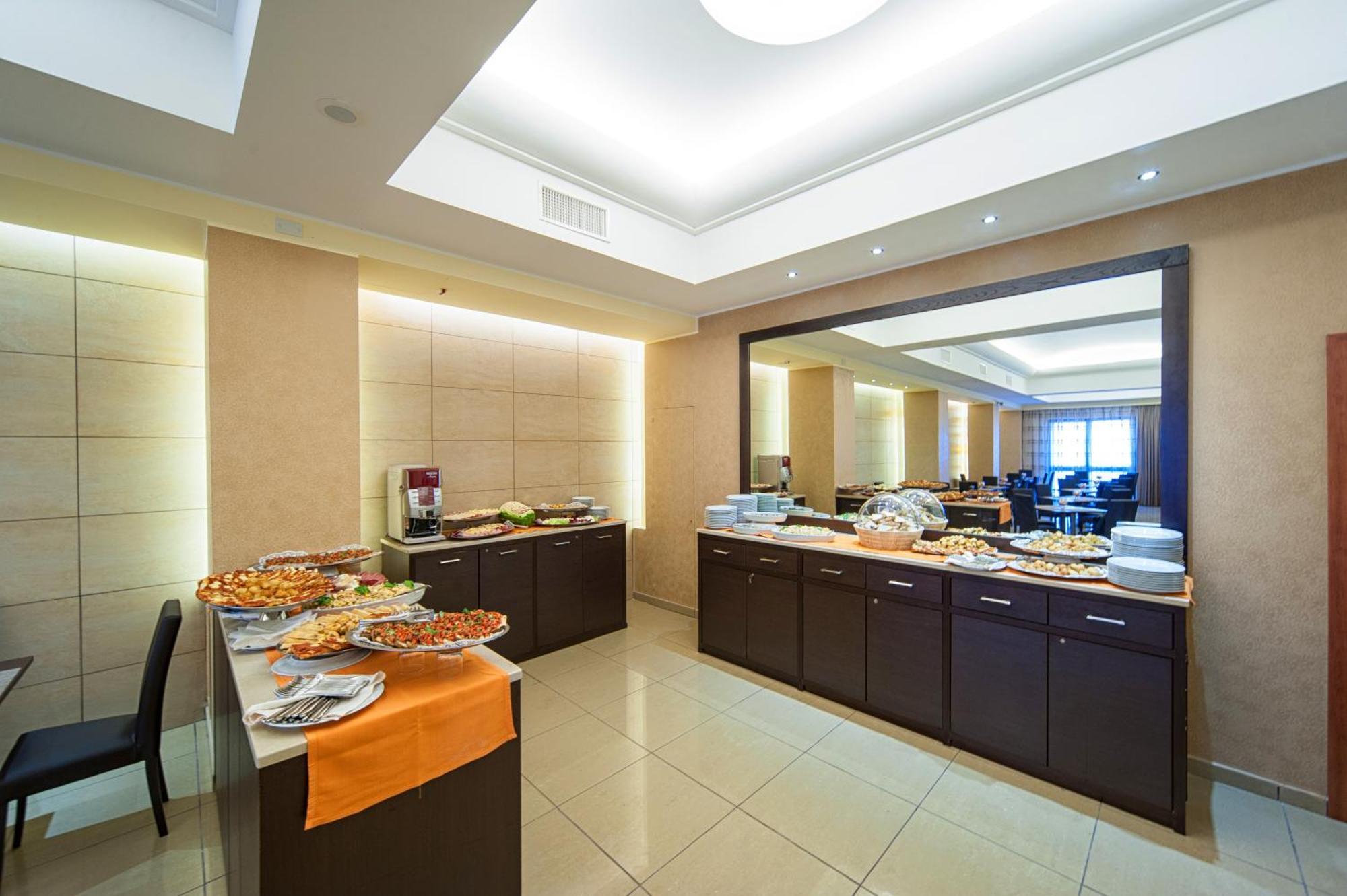 โรงแรมเตียมโป เนเปิลส์ ร้านอาหาร รูปภาพ